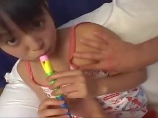 Thiếu niên á châu gà con chơi với ống sáo buộc đến chơi manhood